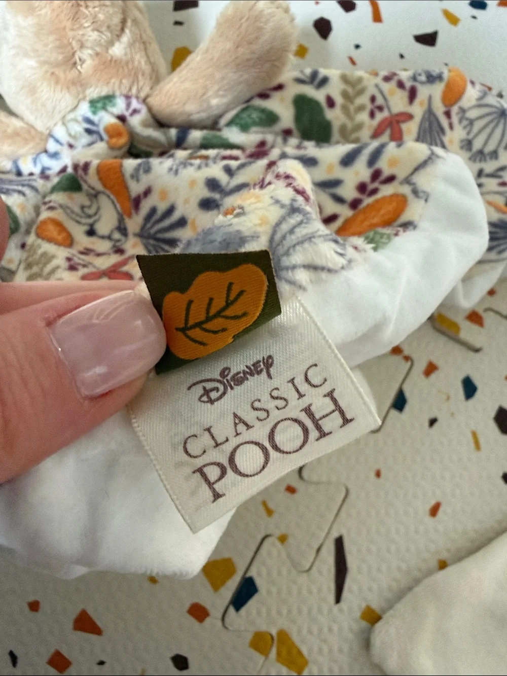 Disney Plush Bear Lovey Blanket in Cream with Multicolor Leaf Print